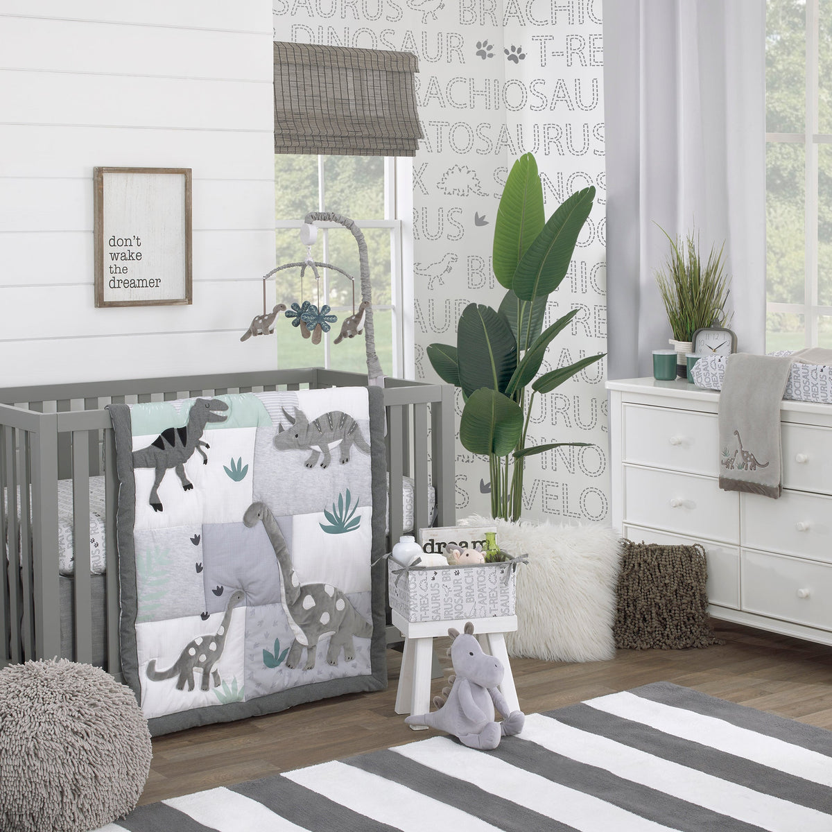 Baby-Saurus Gray, White, and Green Triceratops,  Brontosaurus, and Tyrannosaurus Dinosaurs with Mountains and Leaves 4 Piece Nursery Crib Bedding Set - Comforter, 100% Cotton Fitted Crib Sheet, Crib Skirt, and Storage